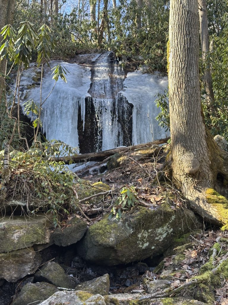 Some Full Day Hikes take you to Mountaineer Falls frozen in winter.