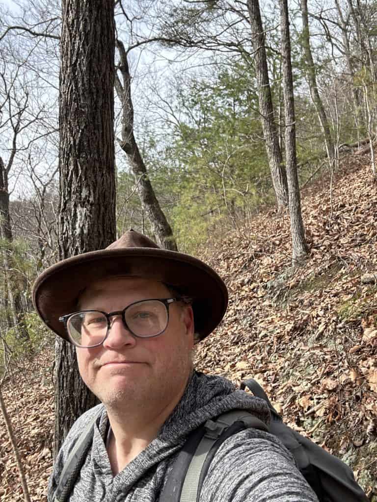 Ryan on a mountain practicing solitude. | Eremos | Intentional Solitude